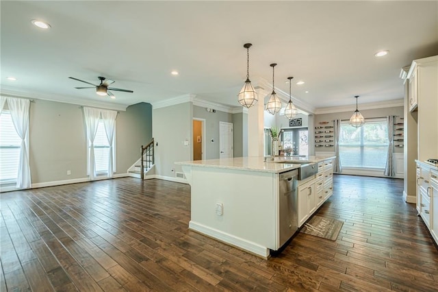 875 Soaring Cir, Marietta, GA 30062 - kitchen with dishwasher, a ceiling fan, dark wood-style flooring, white cabinets, and crown molding