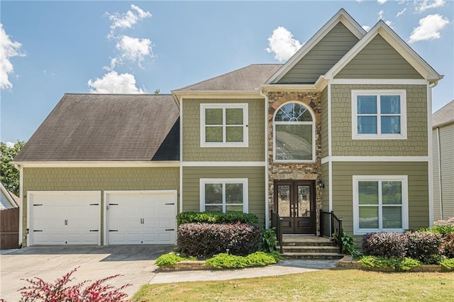 875 Soaring Cir, Marietta, GA 30062 - view of front of property with driveway, french doors, and a garage