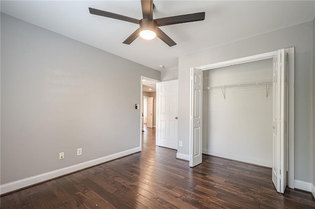 875 Soaring Cir, Marietta, GA 30062 - unfurnished bedroom featuring dark wood-type flooring, a closet, and ceiling fan