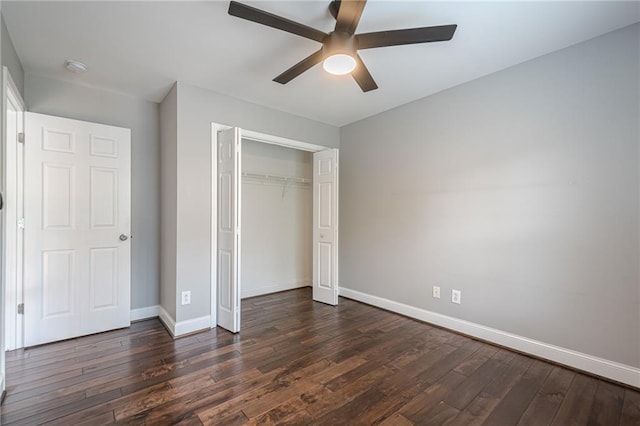 875 Soaring Cir, Marietta, GA 30062 - unfurnished bedroom with dark wood-type flooring, a closet, and a ceiling fan