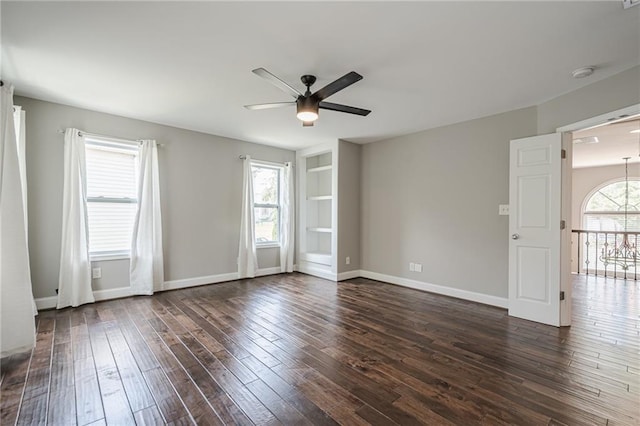 875 Soaring Cir, Marietta, GA 30062 - spare room featuring a smoke detector, a ceiling fan, and dark wood finished floors