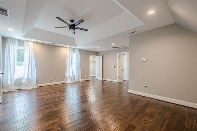 875 Soaring Cir, Marietta, GA 30062 - unfurnished room featuring ceiling fan, a tray ceiling, and dark wood-type flooring