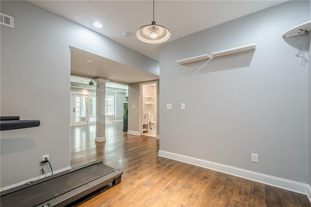 875 Soaring Cir, Marietta, GA 30062 - exercise area featuring decorative columns, wood finished floors, and recessed lighting