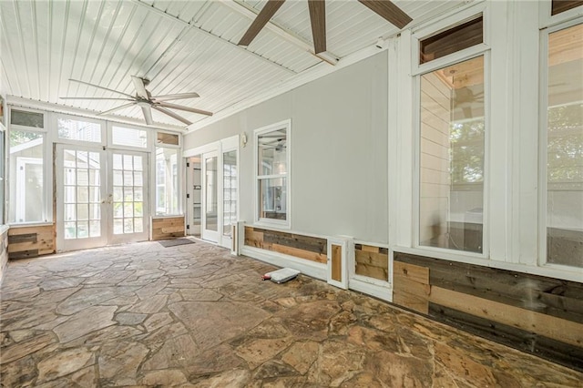 875 Soaring Cir, Marietta, GA 30062 - unfurnished sunroom with french doors, a ceiling fan, and stone floors