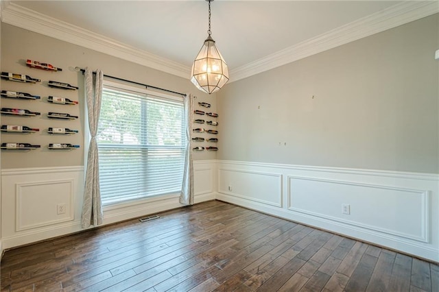 875 Soaring Cir, Marietta, GA 30062 - unfurnished room featuring wainscoting, crown molding, dark wood-style floors, and a decorative wall