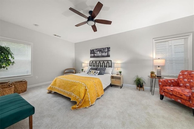 carpeted bedroom featuring ceiling fan