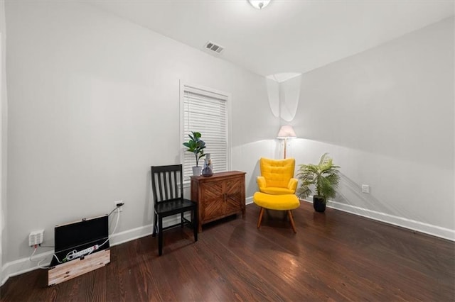 living area with dark hardwood / wood-style floors