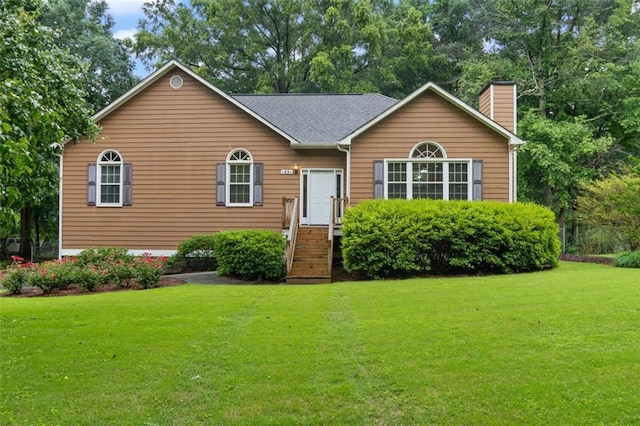 48 Saddle Field Cir NW, Cartersville, GA 30121 - view of front of home with a front yard and a chimney