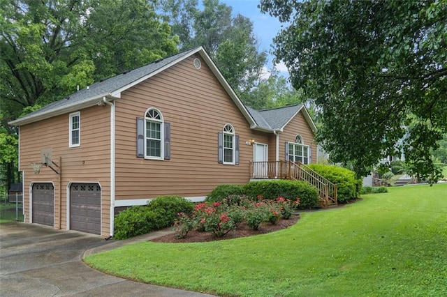48 Saddle Field Cir NW, Cartersville, GA 30121 - view of home's exterior featuring a garage, concrete driveway, and a yard
