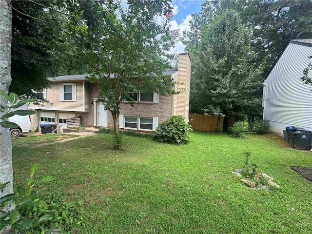 view of yard featuring a garage