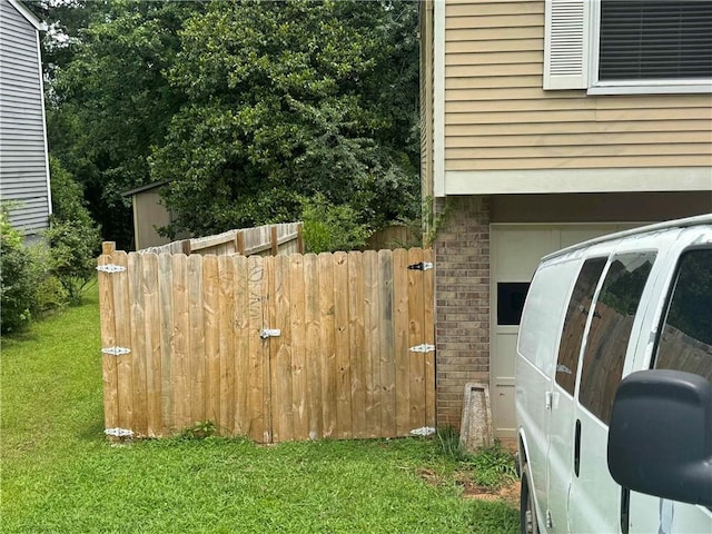 view of side of home featuring brick siding