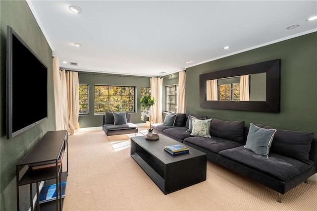 carpeted living room with recessed lighting, visible vents, crown molding, and baseboards