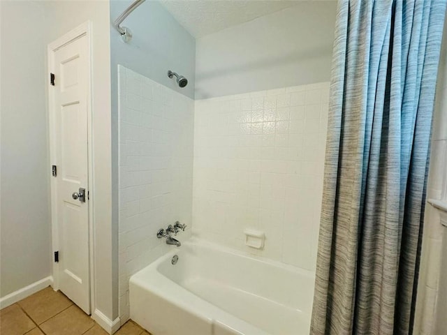 3210 Ebenezer Rd, Marietta, GA 30066 - full bath with shower / tub combo, tile patterned floors, and baseboards