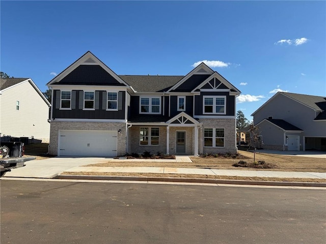 craftsman house featuring a garage