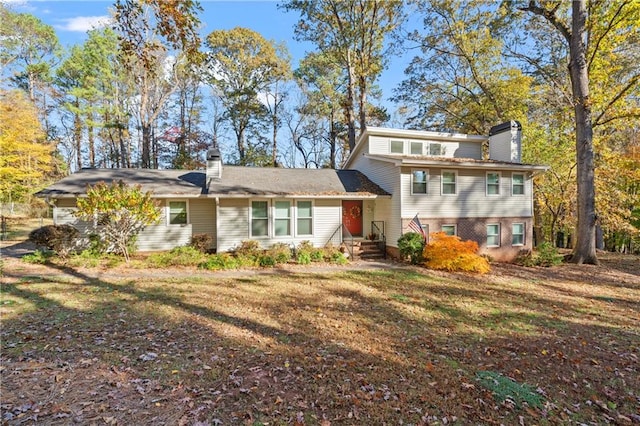 view of front of house with a front lawn