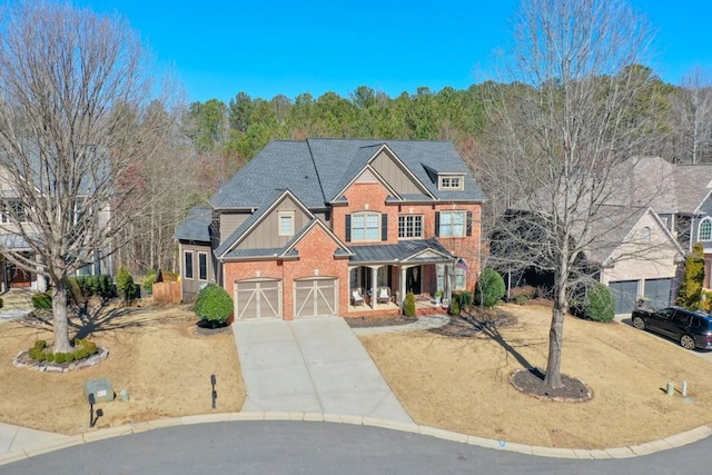 view of front of property with a garage and covered porch