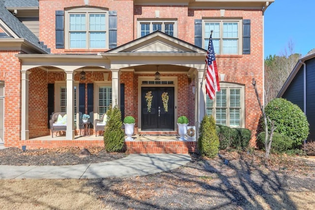 entrance to property with covered porch