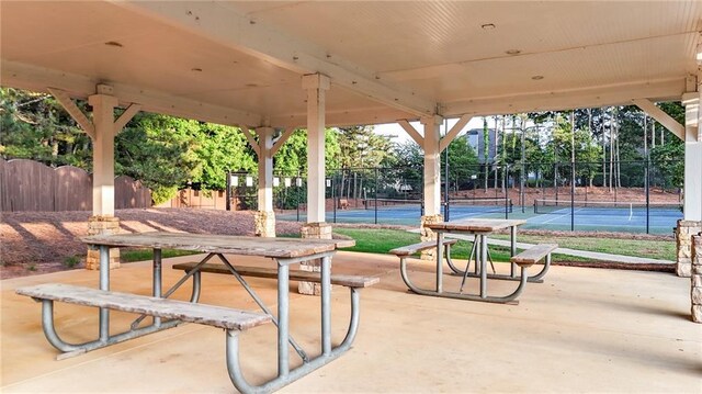 4963 Kingsbridge Ct, Powder Springs, GA 30127 - view of patio featuring a tennis court