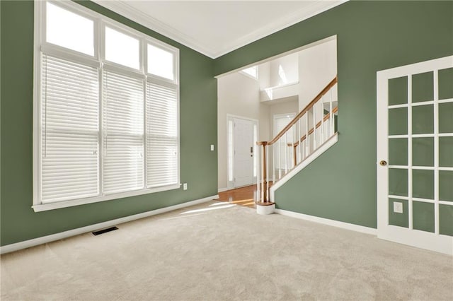 4963 Kingsbridge Ct, Powder Springs, GA 30127 - unfurnished room with crown molding, carpet floors, stairway, and baseboards