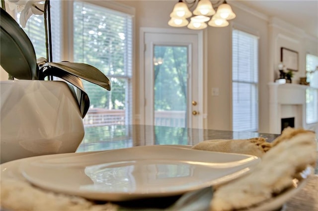 4963 Kingsbridge Ct, Powder Springs, GA 30127 - bathroom featuring a chandelier, healthy amount of natural light, and a fireplace