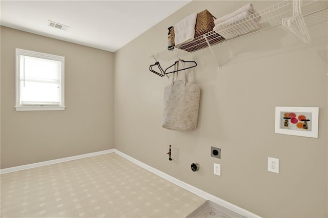 4963 Kingsbridge Ct, Powder Springs, GA 30127 - laundry area featuring electric dryer hookup, washer hookup, baseboards, carpet flooring, and hookup for a gas dryer