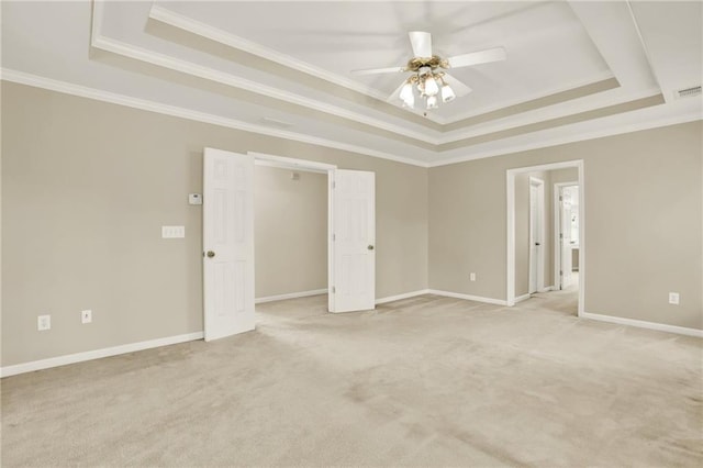 4963 Kingsbridge Ct, Powder Springs, GA 30127 - unfurnished room featuring a raised ceiling, crown molding, ceiling fan, light colored carpet, and baseboards
