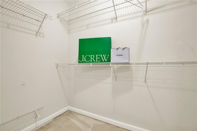 4963 Kingsbridge Ct, Powder Springs, GA 30127 - walk in closet featuring carpet