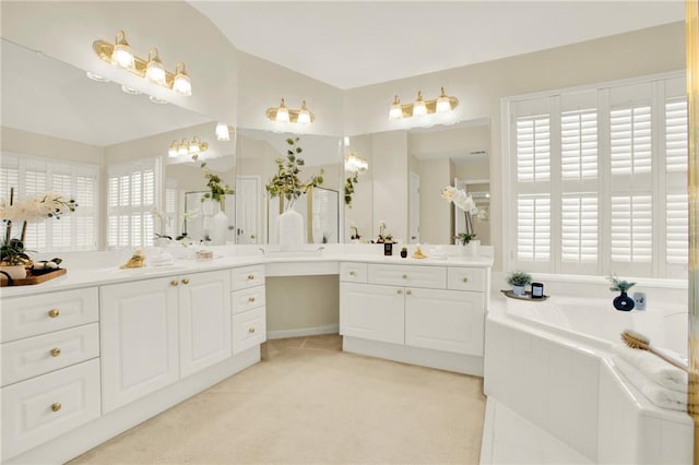 4963 Kingsbridge Ct, Powder Springs, GA 30127 - bathroom with vanity and a garden tub