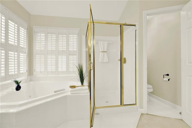 4963 Kingsbridge Ct, Powder Springs, GA 30127 - bathroom featuring a bath, a stall shower, toilet, and tile patterned flooring