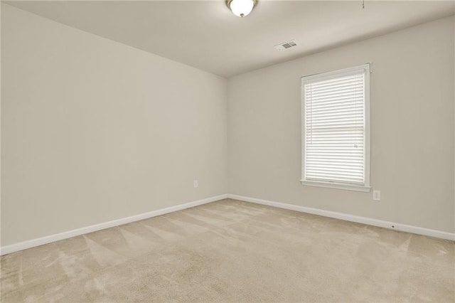 4963 Kingsbridge Ct, Powder Springs, GA 30127 - spare room featuring baseboards and light colored carpet