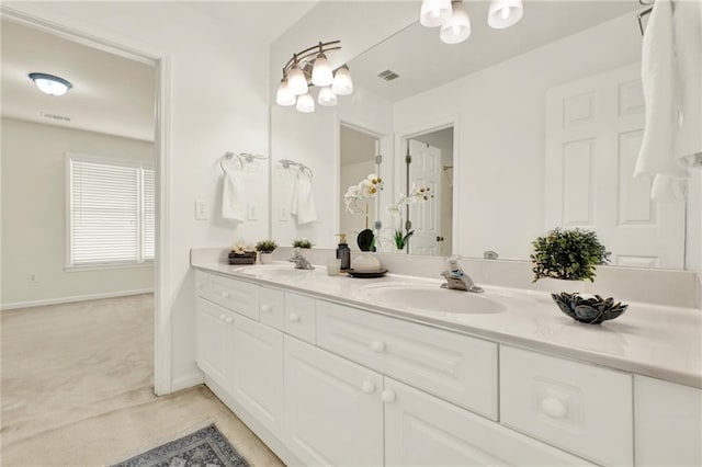 4963 Kingsbridge Ct, Powder Springs, GA 30127 - full bath featuring double vanity, a chandelier, and baseboards