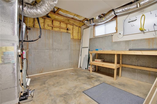 4963 Kingsbridge Ct, Powder Springs, GA 30127 - below grade area featuring a workshop area and heating unit