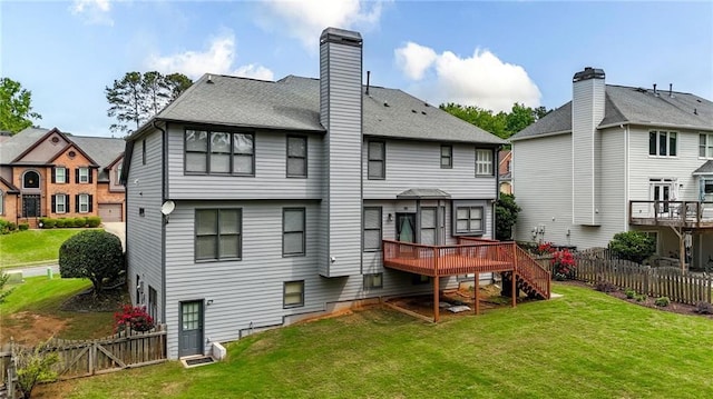 4963 Kingsbridge Ct, Powder Springs, GA 30127 - back of house with a deck, a chimney, roof with shingles, and a residential view