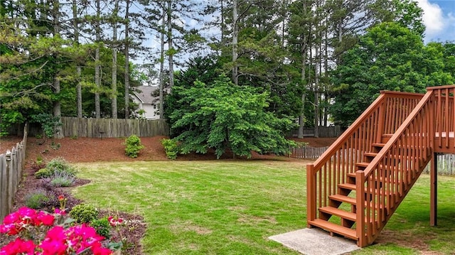 4963 Kingsbridge Ct, Powder Springs, GA 30127 - view of yard with stairway and a wooden deck
