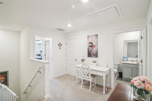 home office with light carpet, attic access, visible vents, baseboards, and recessed lighting