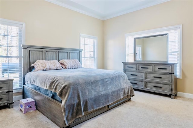 bedroom featuring light carpet, ornamental molding, and baseboards