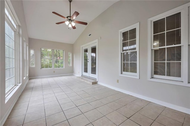 unfurnished sunroom with lofted ceiling and ceiling fan