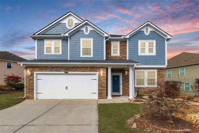 craftsman house featuring a garage