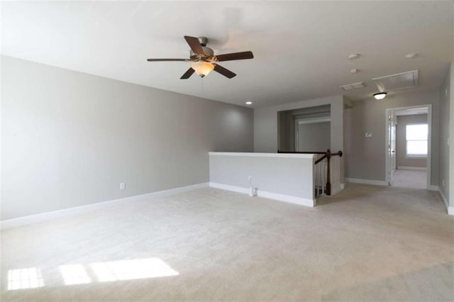 carpeted empty room with ceiling fan