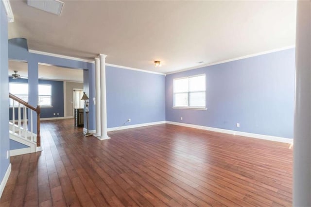 unfurnished room with crown molding and dark hardwood / wood-style floors