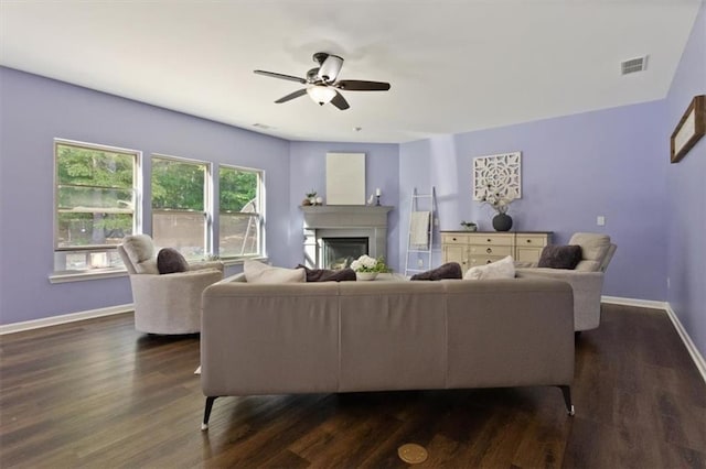 211 Parc Dr, Canton, GA 30114 - living room featuring dark wood-type flooring, baseboards, and a ceiling fan