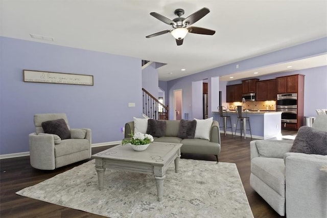 211 Parc Dr, Canton, GA 30114 - living room with ceiling fan, stairway, dark wood-type flooring, baseboards, and recessed lighting