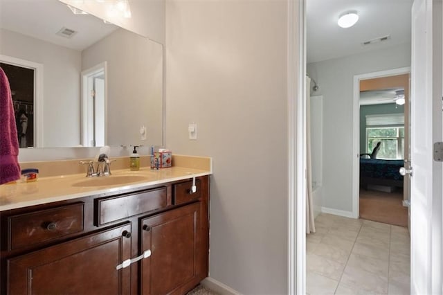 211 Parc Dr, Canton, GA 30114 - full bathroom with vanity, a shower, baseboards, tile patterned flooring, and ceiling fan