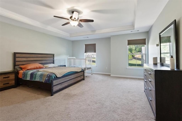211 Parc Dr, Canton, GA 30114 - bedroom with a raised ceiling, light carpet, baseboards, ornamental molding, and a ceiling fan