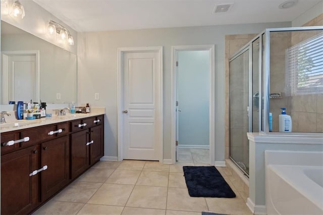 211 Parc Dr, Canton, GA 30114 - bathroom with a shower stall, double vanity, a garden tub, tile patterned flooring, and baseboards