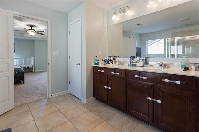211 Parc Dr, Canton, GA 30114 - full bath featuring double vanity, a ceiling fan, a shower stall, baseboards, and ensuite bath