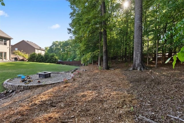211 Parc Dr, Canton, GA 30114 - view of green lawn featuring a fire pit