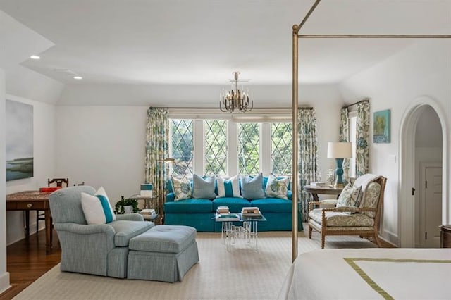 675 W Paces Ferry Rd NW Unit 11, Atlanta, GA 30327 - interior space featuring wood finished floors, a notable chandelier, arched walkways, lofted ceiling, and recessed lighting