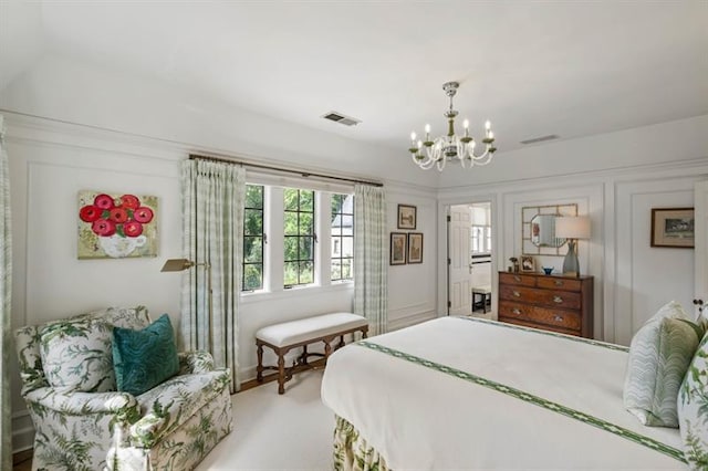 675 W Paces Ferry Rd NW Unit 11, Atlanta, GA 30327 - carpeted bedroom with a chandelier and visible vents