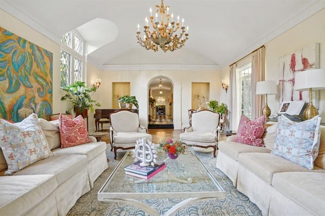 675 W Paces Ferry Rd NW Unit 11, Atlanta, GA 30327 - living area featuring lofted ceiling, a wealth of natural light, a notable chandelier, and arched walkways